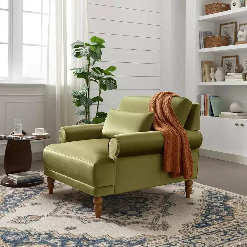 Poltrona oversize con braccioli circolari e cuscino lombare